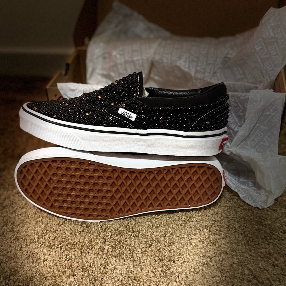 Black, Gold, and White Vans